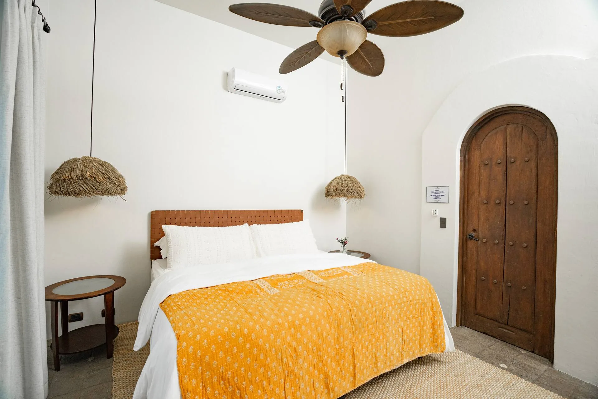Bedroom with king bed and sun-yellow bedspread